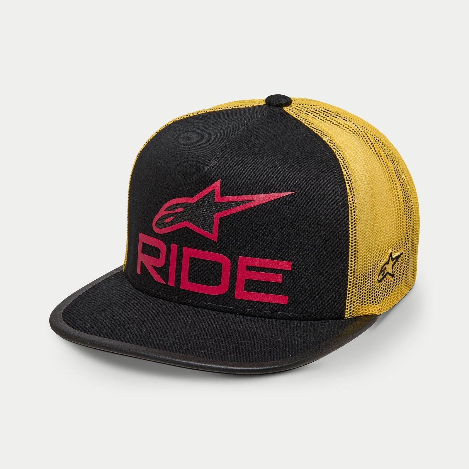 Alpinestars Ride 4.0 Trucker Hat, Black and Yellow with Red branding, flat bill and structured crown, 3D Ride logo on front, yellow mesh back with side embroidery, casual motorsport-inspired cap