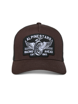 Alpinestars Heritage Patch Trucker Hat, Brown front with Black mesh back, curved bill and structured crown, large embroidered patch with winged wheel and "Racing Ahead" graphic, casual motorsport-inspired headwear