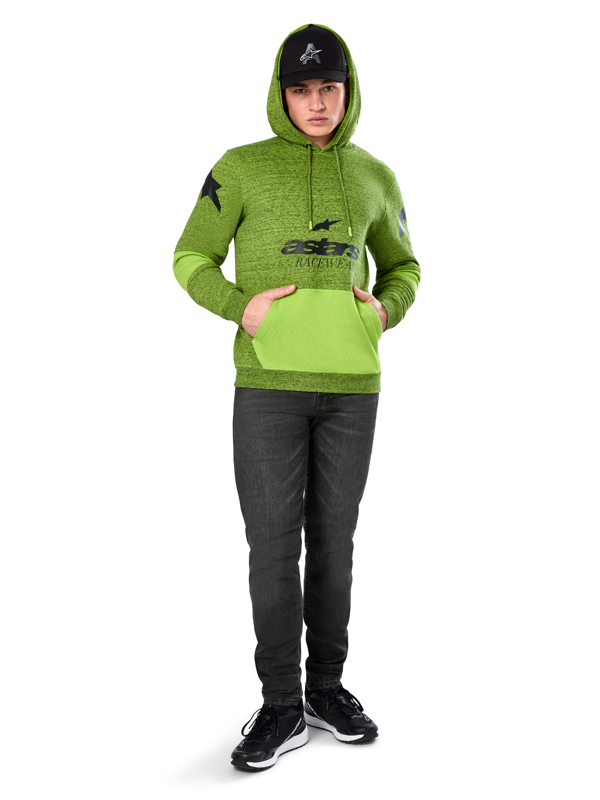 Alpinestars Perpetuate Hoodie, Lime Green heather pullover fleece with contrasting bright green kangaroo pocket and sleeve panels, black 'astars' front graphic, styled with a black cap and dark jeans, casual motorsport-inspired streetwear