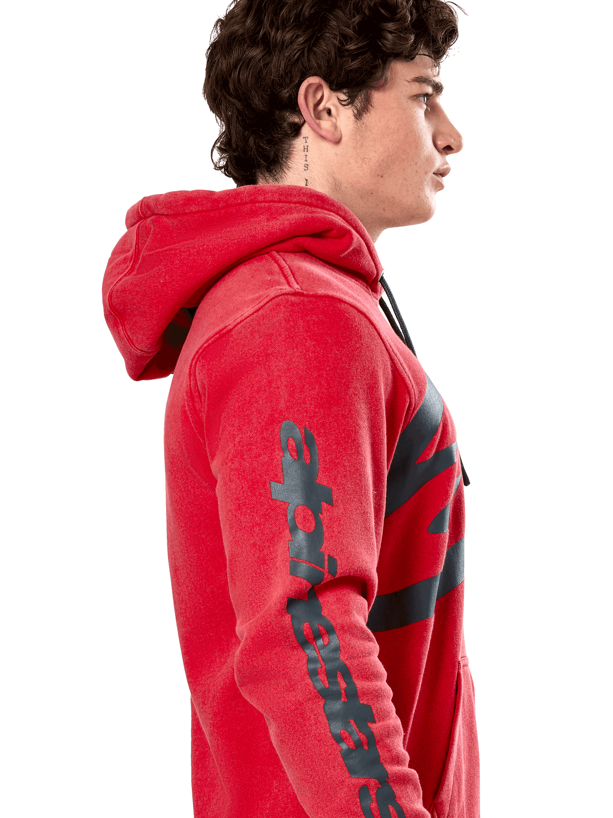 Alpinestars Unbound Hoodie, Red pullover fleece hoodie, side profile showing dark gray Alpinestars wordmark on the sleeve, garment-dyed finish with a drawstring hood, casual motorsport streetwear