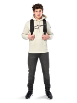 Alpinestars Insignia Hoodie, casual streetwear, Off White fleece pullover, carbon fiber look logo with red outline, drawstring hood, kangaroo pocket, worn by model with black backpack and dark grey jeans
