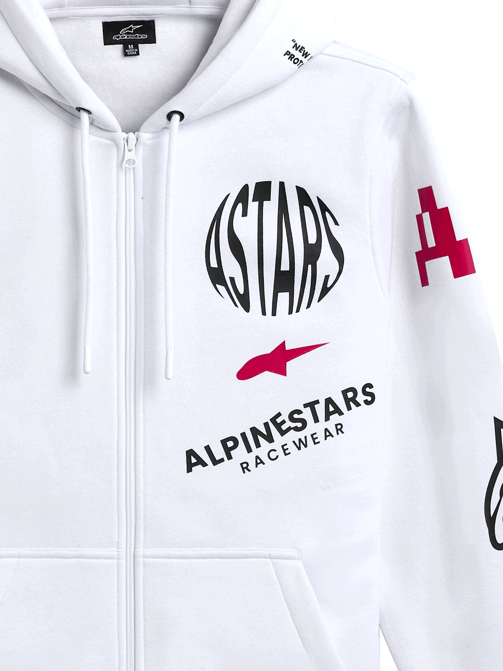 Alpinestars Variegate Hoodie, white zip-front fleece hoodie, featuring circular black ASTARS logo, red star symbol, and Alpinestars Racewear branding on the chest, casual motorsport streetwear