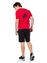 Alpinestars Formulate Csf Tee, Short Sleeve T-Shirt, Red, Large black perforated Astars logo on the back, worn with black shorts and sneakers, casual motorsport-inspired streetwear