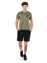 Alpinestars Attrition Performance Tee, Short Sleeve T-Shirt, Light Green, featuring a black Astars logo on the chest, worn with black athletic shorts and black sneakers, casual performance sportswear lifestyle shot