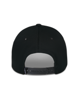 Alpinestars Luminary Hat, Black, rear view showing adjustable snapback closure and small woven logo label, structured cotton crown, casual motorsport-inspired headwear