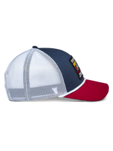 Alpinestars Selica Trucker Hat, Navy Red and White, side profile view featuring navy blue crown, red curved bill, and white mesh back panels, braided rope trim, casual motorsport lifestyle headwear