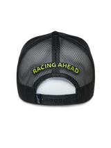 Alpinestars Exceed Trucker Hat, Black Trucker Cap, Back view showing mesh panels and snap-back closure, Lime Green 'RACING AHEAD' embroidery, casual motorsport-inspired headwear