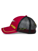 Alpinestars Exceed Trucker Hat, Red and Black side view, curved bill with yellow piping, black mesh back panels, yellow AS and star logo embroidery, casual motorsport-inspired headwear