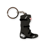 Alpinestars New Tech 10 Boot Keyfob, Black with White and Red Accents, miniature 3D replica of the iconic motocross boot, detailed molded buckles and branding, silver metal keyring