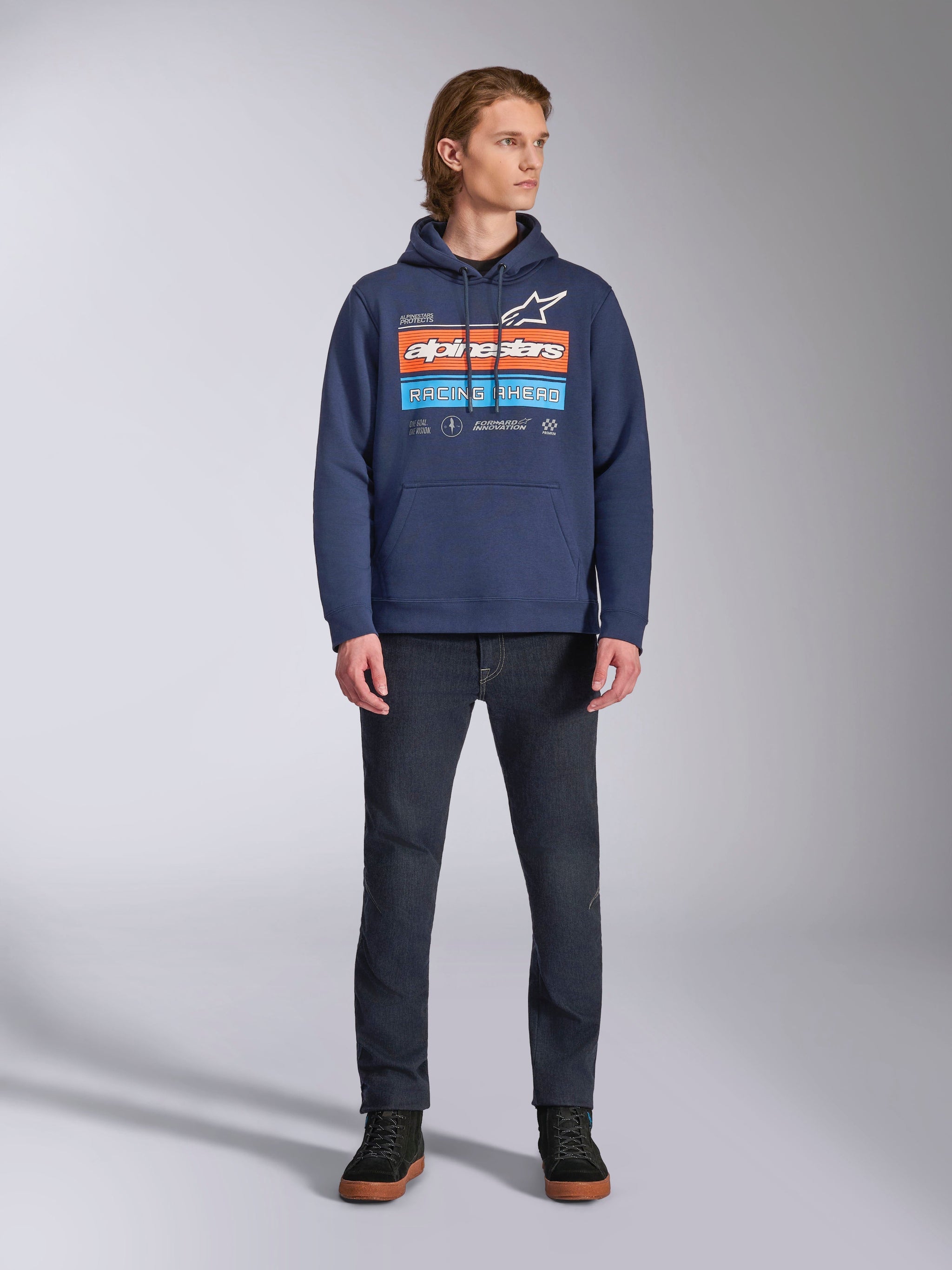 Alpinestars Harken Hoodie, Navy blue pullover fleece, bold multi-colored front graphic with 'RACING AHEAD' and Alpinestars wordmark, kangaroo pocket, drawstring hood, casual motorsport-inspired streetwear