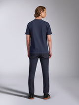Alpinestars Collared CSF Tee, Short Sleeve T-Shirt, Navy Blue, back view on model wearing dark denim jeans and black sneakers, sustainable performance moisture-wicking fabric, casual sportswear