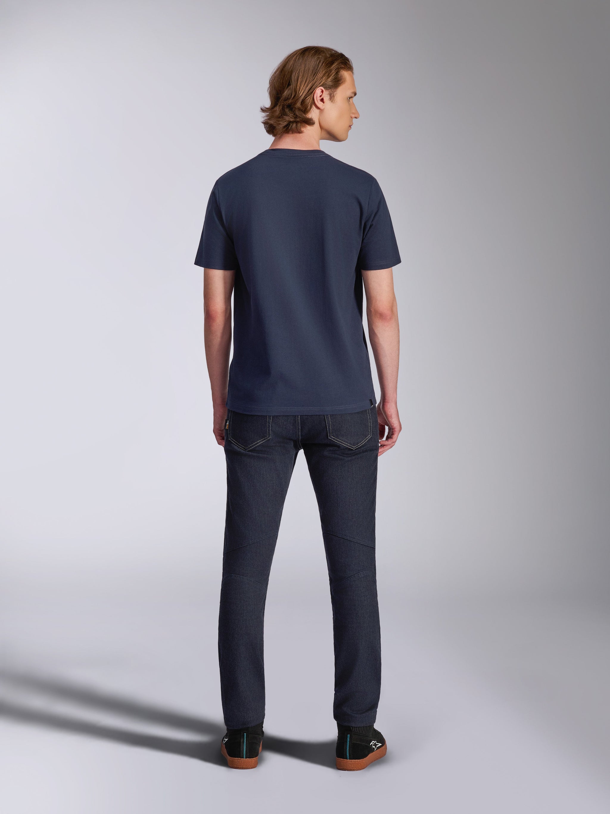 Alpinestars Collared CSF Tee, Short Sleeve T-Shirt, Navy Blue, back view on model wearing dark denim jeans and black sneakers, sustainable performance moisture-wicking fabric, casual sportswear