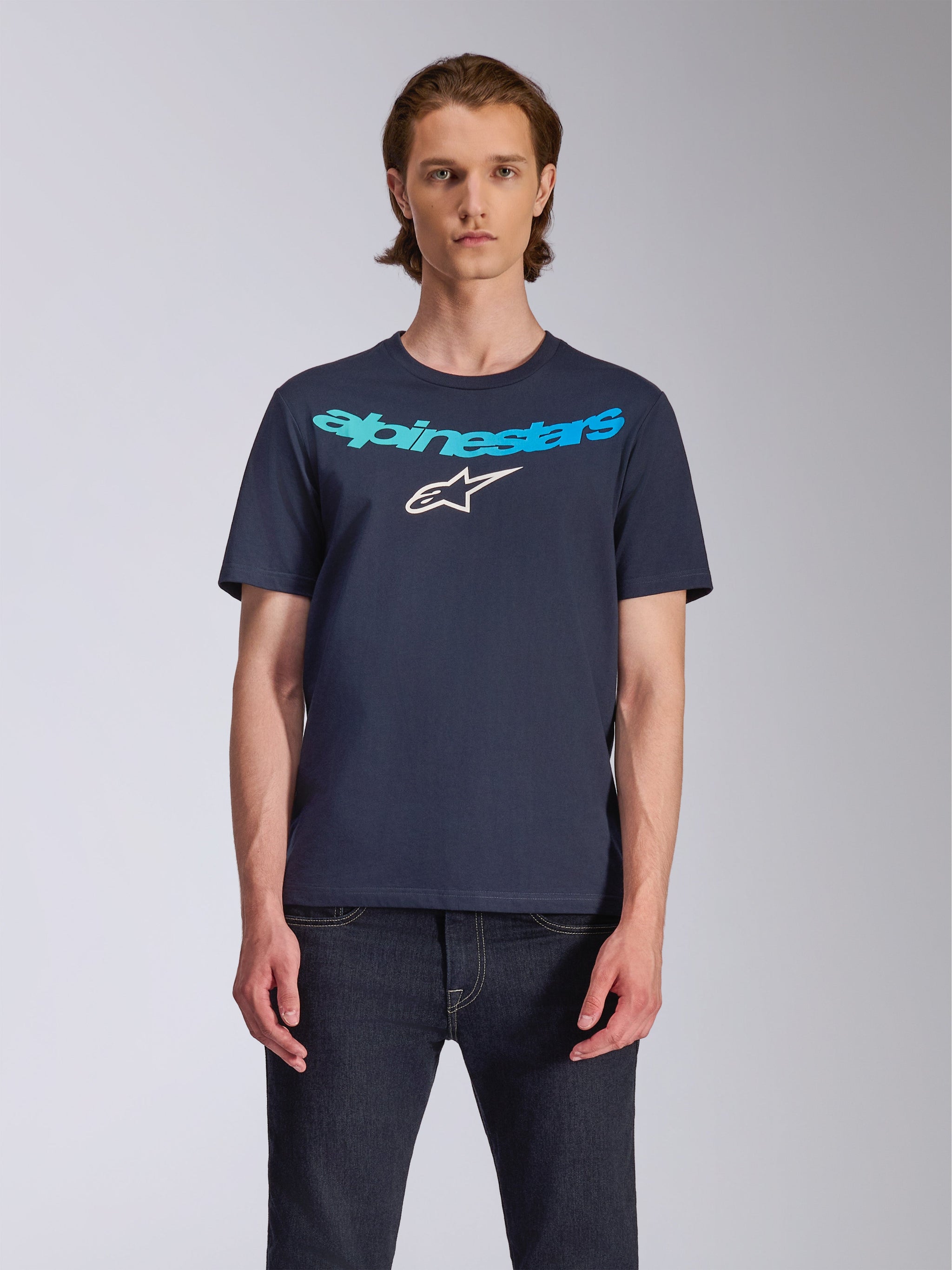 Alpinestars Collared CSF Tee, Short Sleeve T-Shirt, Navy Blue, Teal and light blue Alpinestars text graphic with white star logo, worn with dark denim, casual performance sportswear