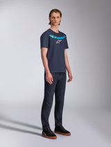 Alpinestars Collared CSF Tee, Short Sleeve T-Shirt, Navy Blue, light blue Alpinestars text and white star logo on chest, worn by model with dark denim pants and black sneakers, casual sportswear style