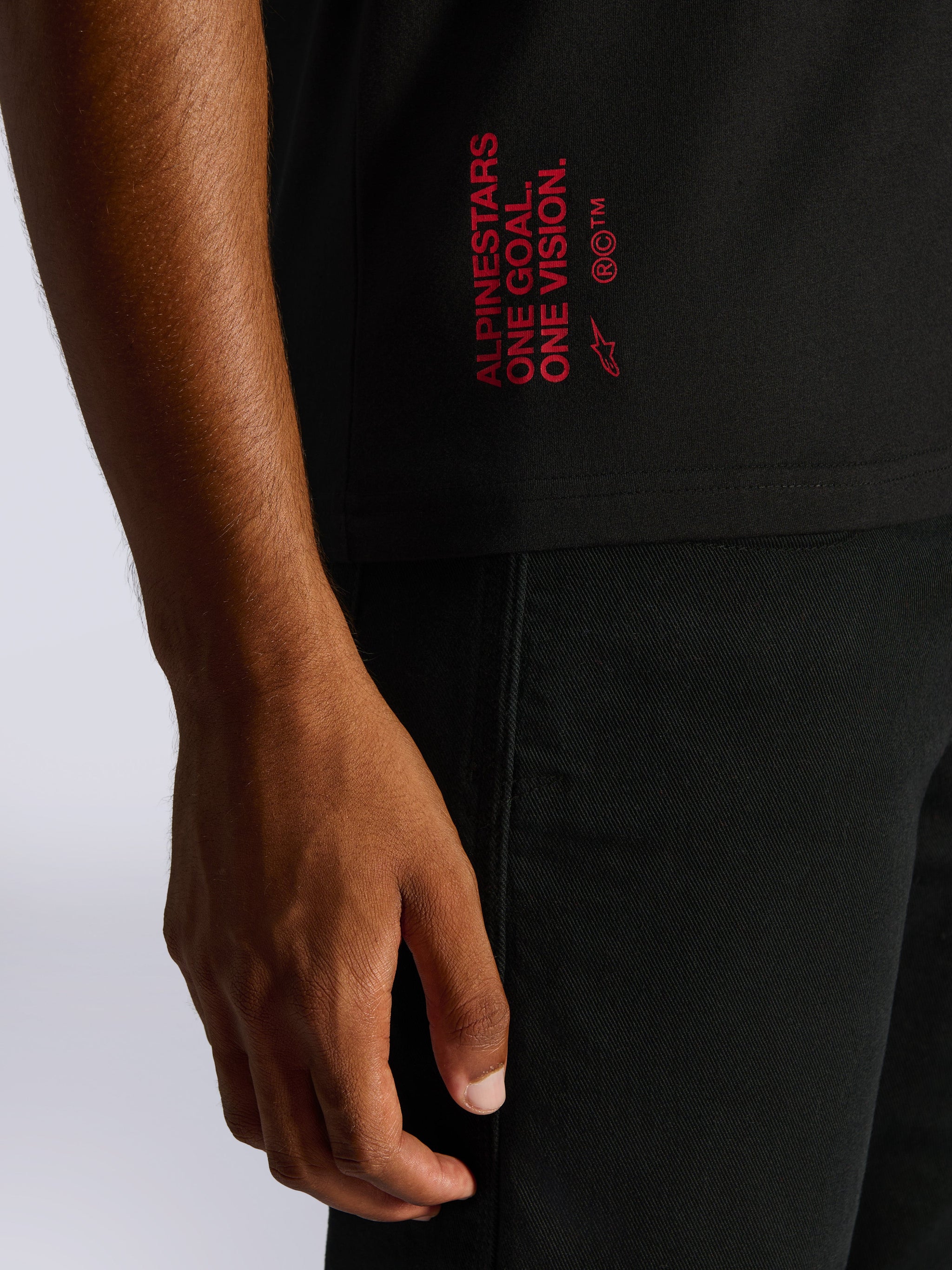 Alpinestars Shaded CSF Tee, Short Sleeve T-Shirt, Black, Close-up of red back word graphic featuring 'Alpinestars One Goal. One Vision.' with Astar logo, casual motorsport streetwear