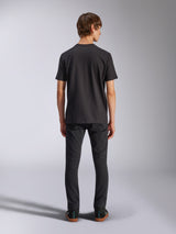 Alpinestars Harken CSF Tee, Short Sleeve T-Shirt, Black, back view showing fit, worn with black slim-fit pants and sneakers, casual motorsport-inspired lifestyle apparel