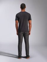 Alpinestars Heritage Patch CSF Tee, Short Sleeve T-Shirt, Black, back view of male model wearing the shirt and dark denim jeans, casual motorsport-inspired lifestyle apparel