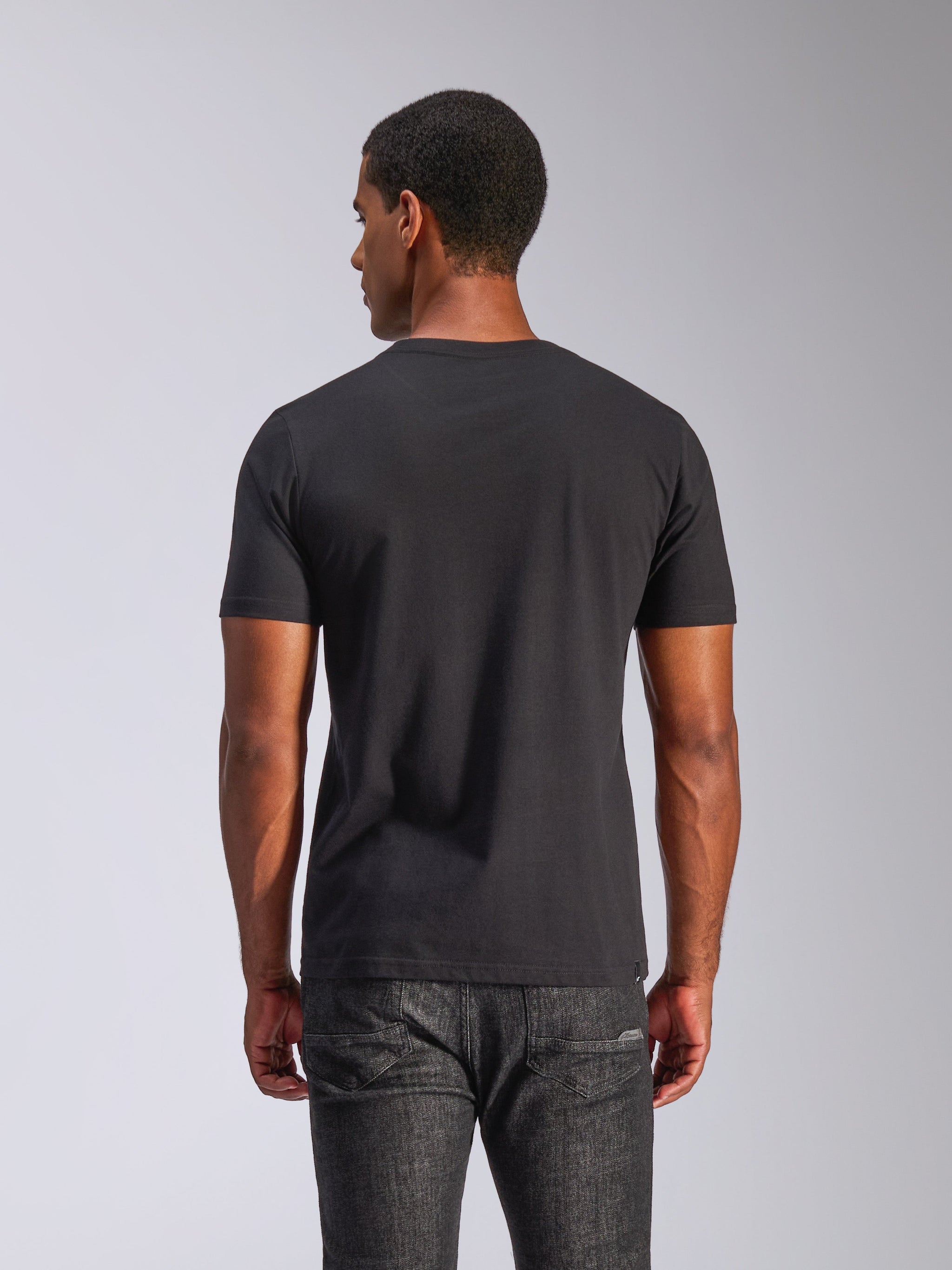 Alpinestars Tech Boot CSF T-Shirt, black casual motorsport streetwear, cotton blend, back view on model.