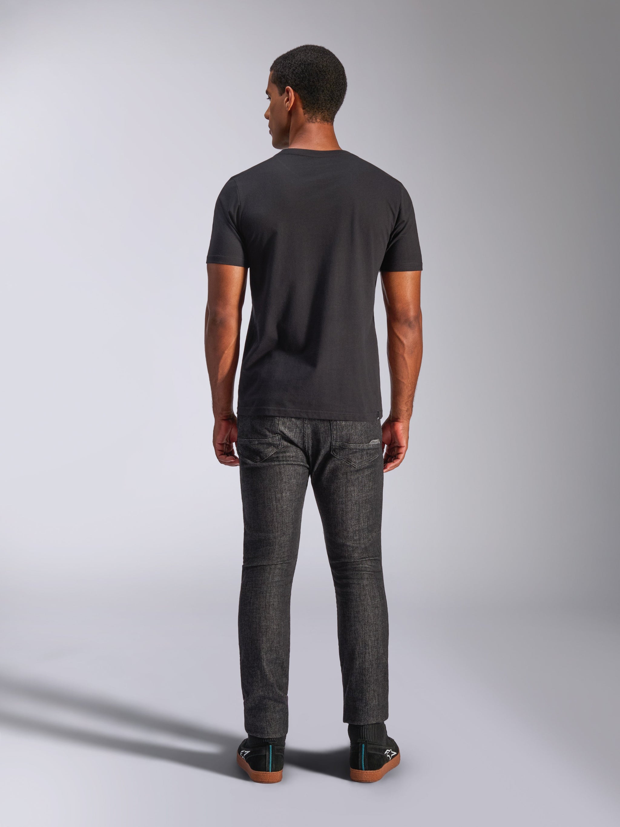 Alpinestars Tech Boot CSF T-Shirt, black casual motorsport sportswear, soft cotton blend, back view on model.