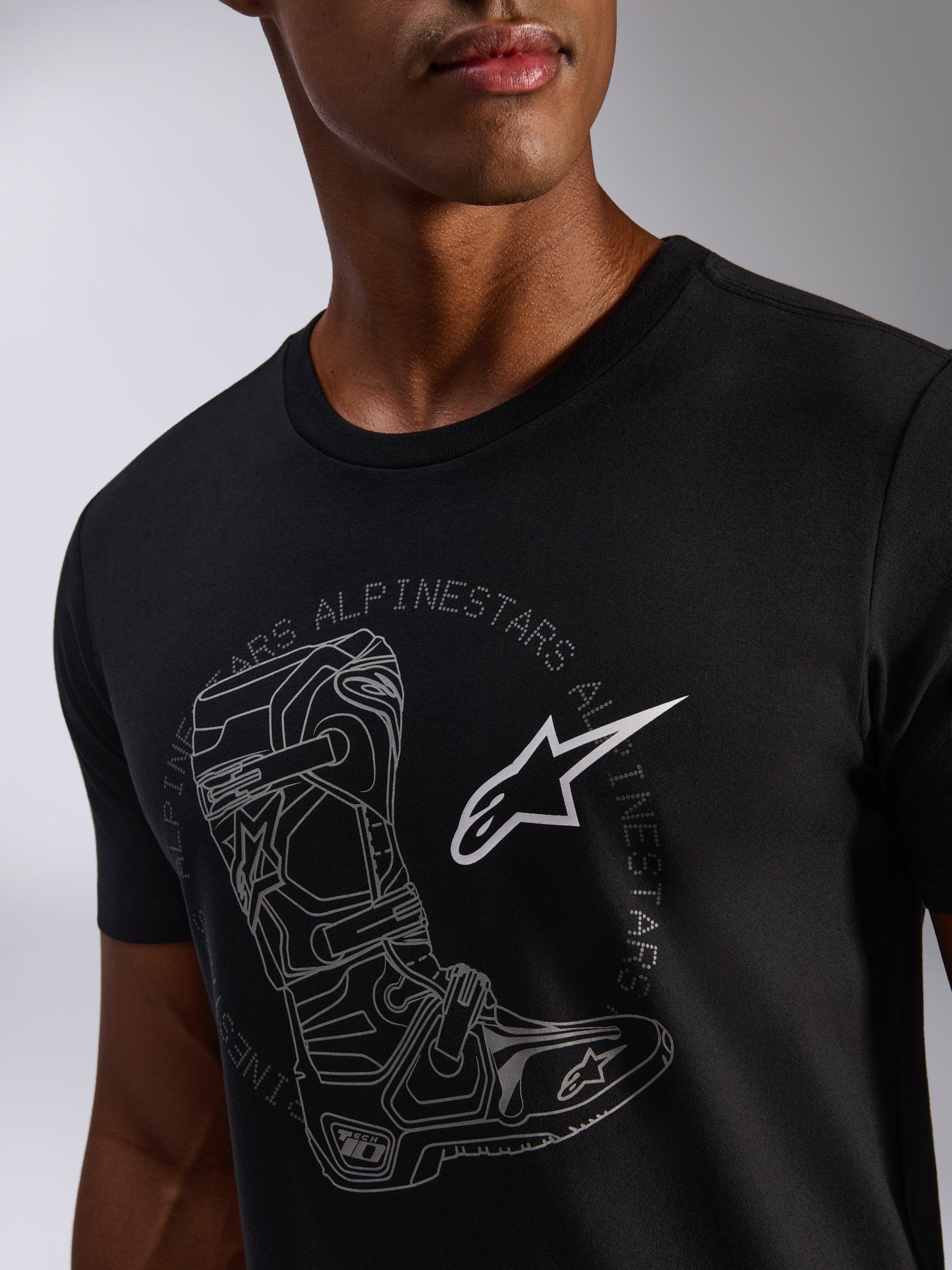 Alpinestars Tech Boot CSF T-Shirt, Black Unisex Sportswear Tee, featuring a Tech 10 motocross boot and white star logo.