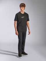 Alpinestars Frontal CSF Tee, Short Sleeve T-Shirt, Black, White Astars Logo on Chest, worn by a model with dark jeans and black sneakers, Casual Performance Streetwear