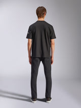 Alpinestars Frontal CSF Tee, Short Sleeve T-Shirt, Black, Rear view on model wearing black jeans, casual performance streetwear featuring small white sleeve logo detail