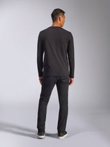 Alpinestars Trackside CSF Tee, Long Sleeve T-Shirt, Black, Back view of model wearing the shirt with dark pants, casual motorsport-inspired streetwear