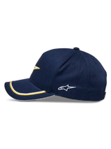 Alpinestars Ascension Snapback Hat, Navy Gold, side profile featuring a curved bill with gold and white double sutache trim, embroidered side logo, casual motorsport streetwear