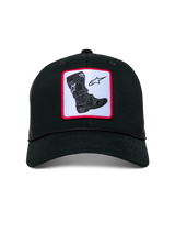 Alpinestars Booted Trucker Hat, black mesh-back cap, features a front woven patch with a Tech Boot graphic and star logo on a white background with a red border, curved bill with braided rope trim, casual motorsport streetwear
