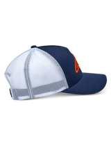 Alpinestars Ageless Trucker Hat, side profile view, Navy Blue and White, featuring a navy twill front and bill with breathable white mesh back, orange 3D embroidered Astars logo, casual motorsport-inspired headwear