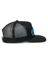 Alpinestars Notice Trucker Hat, side profile view, black twill front with black poly mesh back, blue 3D embroidered logo and white text on the front, flat bill with braided rope detail, casual motorsport headwear