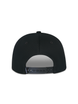 Alpinestars Thickness Snapback Hat, Black, back view showing the adjustable snapback closure, black plastic strap with small white Astars logo tag, structured cotton twill crown, casual sportswear