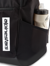 Alpinestars Defcon V3 Backpack, black daily backpack, close-up of side mesh pocket with water bottle, vertical white logo branding on front, durable 600D polyester material