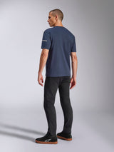 Alpinestars Frontal CSF Tee, Short Sleeve T-Shirt, Navy Blue, back view on model showing sleeve logo, worn with black pants and sneakers, casual motorsport-inspired streetwear