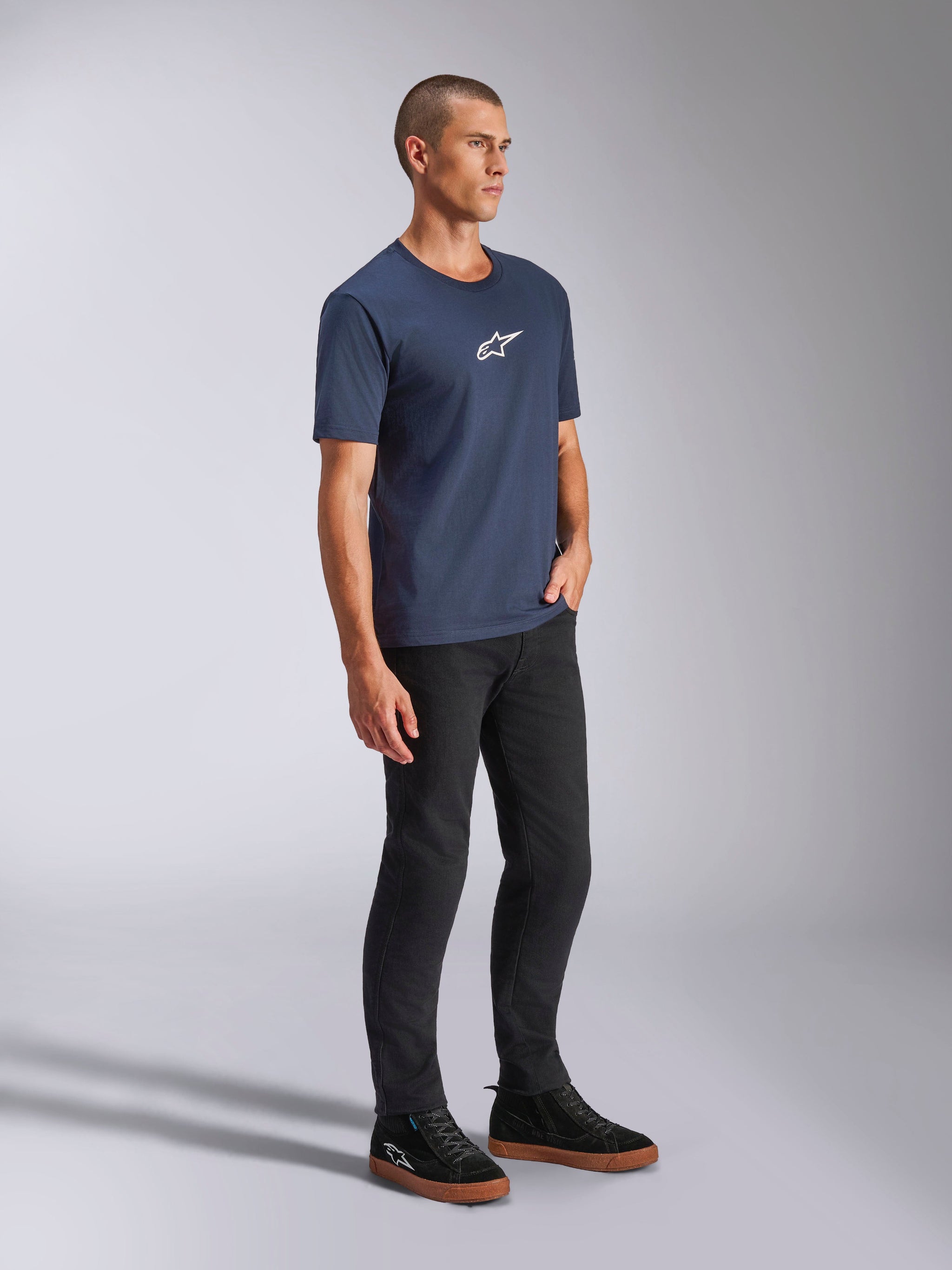 Alpinestars Frontal CSF Tee, Short Sleeve T-Shirt, Navy Blue, Small White Astars Logo on Chest, worn with black pants and sneakers, casual performance streetwear
