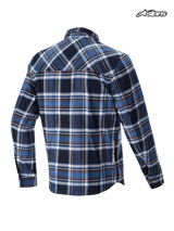 Alpinestars Whistler Wind Block Plaid Shirt, mountain biking casual shirt, blue and black plaid pattern, rear view showing wind-resistant construction and subtle Alpinestars branding on the lower hem