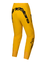 Alpinestars Limited Edition A-Supra Melt Gold Pants, dark yellow mountain bike pants for men featuring a bold MX-inspired black Alpinestars wordmark on the back yoke and 4-way super stretch fabric
