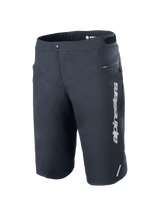 Alpinestars A-Dura Elite Shorts, Mountain Bike Shorts, Black, featuring a vertical white Alpinestars logo on the left leg, zippered side pocket, snap front closure with hook-and-loop waist adjusters, reflective accent, durable 4-way stretch Cordura fabric for off-road cycling