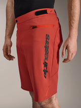 Alpinestars A-Dura Elite Shorts, Mountain Bike Shorts, Dark Orange, featuring a vertical black Alpinestars logo on the side, zippered pocket and hook-and-loop waist adjusters, durable off-road cycling apparel
