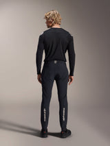 Alpinestars A-Aria Polartec Elite Long Sleeve Jersey, Black MTB Jersey, rear view worn with matching black pants, performance fit for mountain biking, featuring technical moisture-wicking fabric and subtle branding on the lower back