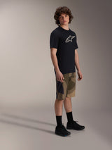 Alpinestars A-Dura Astar Short Sleeve Jersey, Black with white chest logo, worn with camouflage shorts and black MTB shoes, casual mountain bike riding gear