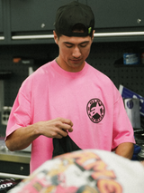 Limited Edition Alpinestars x Dirt Studios Tech Series T-Shirt in Fluo Pink and Black, man wearing cotton streetwear.