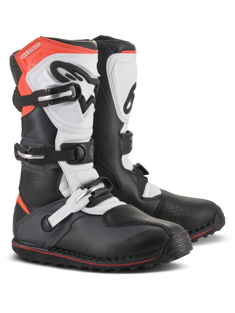 Alpinestars Tech-T Boots, Motorcycle Trials Boots, Black White and Red Fluo, featuring a triple buckle closure system, ergonomic shin plate, textured toe protection, and a low-profile lugged sole, technical off-road footwear design