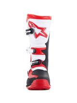Alpinestars Tech-T Boots, Motorcycle Trials Boots, Bright Red Black and White, front view featuring an ergonomic white shin plate with a red star logo, three-buckle closure system, and a rugged black and red toe area, designed for off-road trials riding