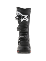 Alpinestars Tech-T Boots, Trials Motorcycle Boots, Black and Red, front view featuring ergonomic shin plate with white Astar logo, three-buckle closure system, and durable leather construction with a red accent on the sole.