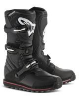 Alpinestars Tech-T Boots, Trials Motorcycle Boots, Black with Red and White accents, features three buckle closure system, ergonomic shin plate with white Astars logo, thin red stripe along the sole, durable leather construction for trials and off-road riding