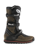 Alpinestars Tech-T Boots, Motorcycle Trials Boots, Brown Oiled and Black, side profile view featuring a triple-buckle closure system, ergonomic shin plate with white logo, rugged textured sole with a red accent stripe, designed for off-road trials riding