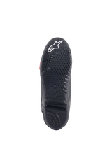 Alpinestars Tech 10 Boots, Motocross Boots, Black sole view, featuring proprietary grip sculpturing with textured tread, white star logo on the toe, and replaceable central sole insert for off-road performance