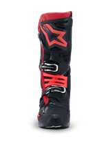 Alpinestars Tech 10 Boots, Motocross Boots, Black and Red, front view featuring large red star logo on the shin plate and silver buckle closures, advanced protective gear for off-road racing