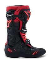 Alpinestars Tech 10 Boots, Motocross Boots, Black and Red, side profile view, three silver aluminum buckles, red star logo on the side and ankle, DHCP technology branding on the heel, reinforced protective chassis for off-road racing.